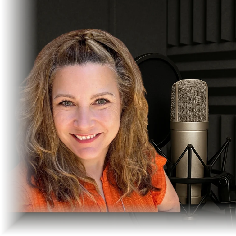 Lesley Nickelson smiling at the microphone in her recording studio
